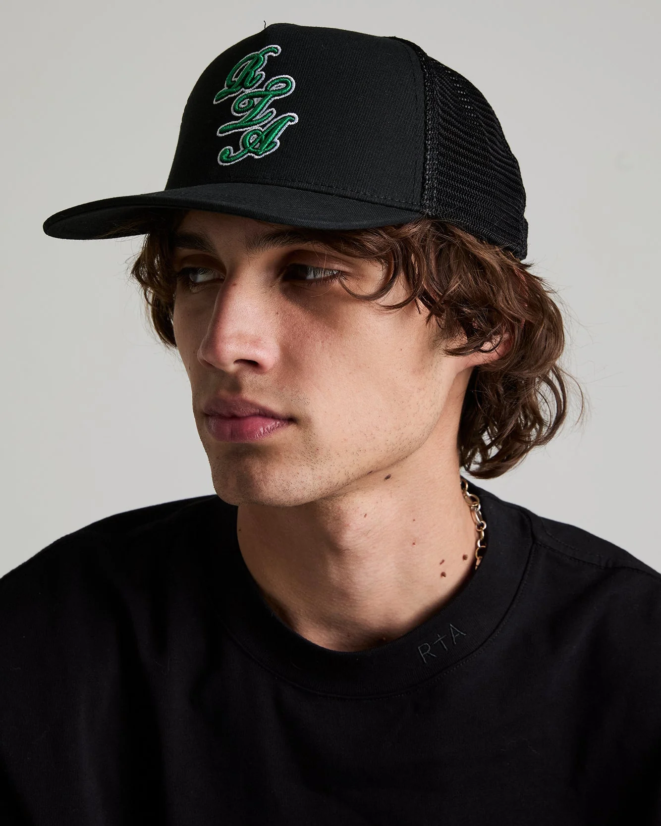 GIDEON TRUCKER HAT | BLACK GREEN SCRIPT LOGO