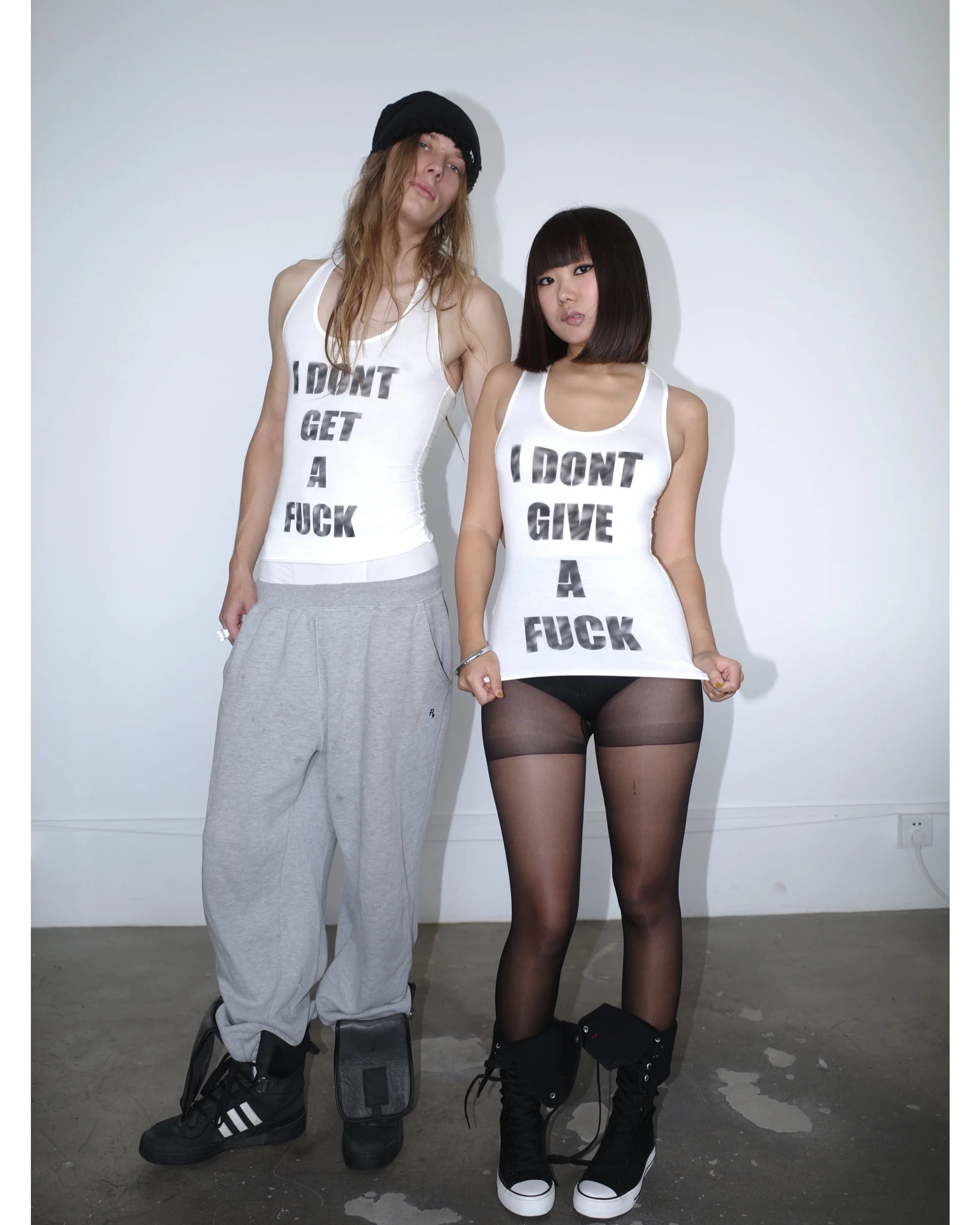 I DONT GIVE/GET A FUCK Spray Tank Top - Image 16
